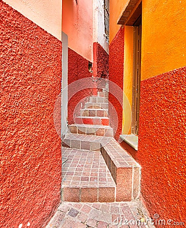 Romantic narrow Alley of the Kiss Callejon del Beso in Guanajuato colorful historic city center Stock Photo