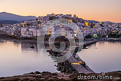 Romantic and peaceful scenery on greek town Naxos at dawn. Concept of tranquility, silence, magic, romantic place. Stock Photo