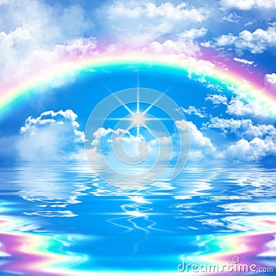 Romantic and peaceful seascape scene with rainbow on cloudy blue sky Stock Photo