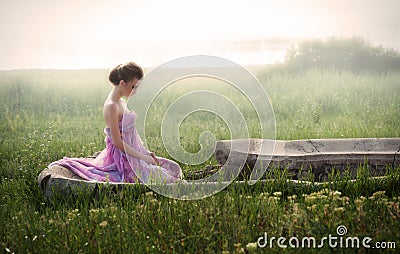 Romantic portrait of woman in ruins Stock Photo