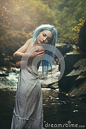 Romantic portrait of a young woman in the stream Stock Photo