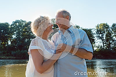 Romantic senior couple enjoying a healthy and active lifestyle outdoors Stock Photo