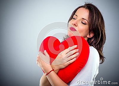 Romantic sentimental woman with a heart Stock Photo