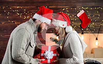 Romantic story. greeting time. celebrate christmas together. winter season sales. couple in love santa hat. Time for Stock Photo