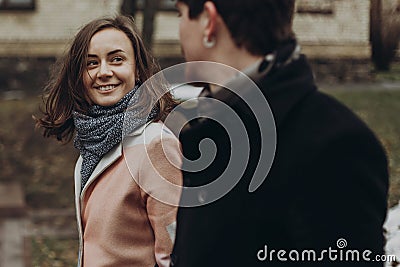 Romantic stylish couple walking and laughing in autumn park. man Stock Photo