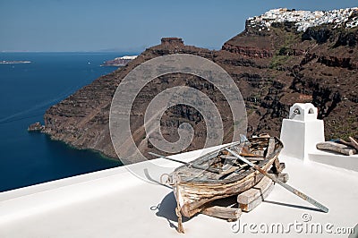 Romantic terrace amid Santorini caldera Stock Photo