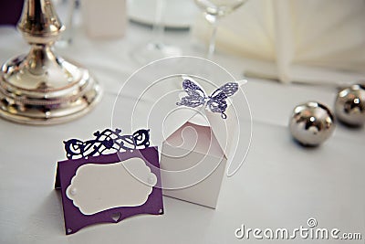 Romantic vintage name sign on the table at wedding reception closeup. Stock Photo