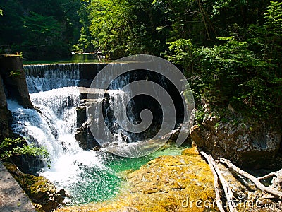 Romantic waterfall with clear blue water in Vintgar Gorge, Radovna River in Julian Alps, Slovenia, Europe Stock Photo