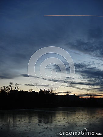 Romantic winter sunset with ice Stock Photo