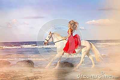 Romantic woman riding unicorn Stock Photo