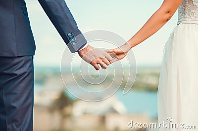 Romantic young couple enjoying sun near river Stock Photo