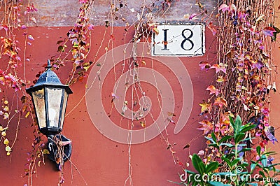 Rome architecture detail with street lamp and house number Stock Photo