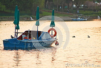 Rome, Italy - April 10, 2011: a boat on the artificial lake of Eur district in Rome Editorial Stock Photo