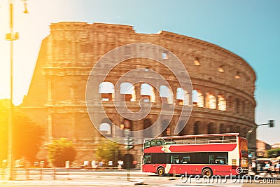 Rome, Italy. Colosseum. Glare Light On Red Hop On Hop Off Touristic Bus For Sightseeing Near Flavian Amphitheatre Editorial Stock Photo