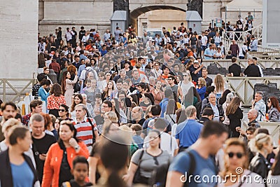 Rome, Italy - 29.10.2019: Crowds of people walking on Saint Peter`s Square in Vatican Editorial Stock Photo