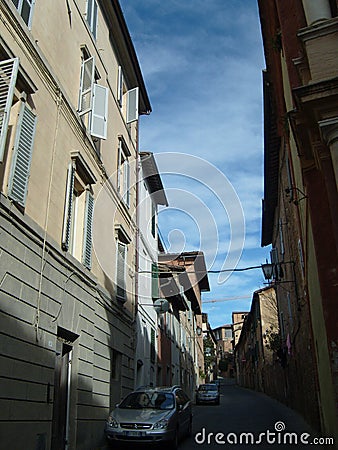 Rome, Italy, December 10, 2007. Facades of residential buildings in Italy. Sunny warm lighting. Windows, shutters and doors Editorial Stock Photo