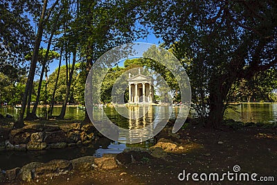 Rome Italy. Garden of Villa Borghese. Lake with boats and temple Stock Photo