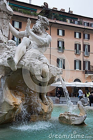 Close view details of the fountain of the four Rivers with Egyptian obelisk in Piazza Navona, Rome, Italy Editorial Stock Photo