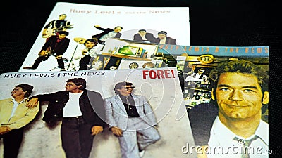 Cover cd and artwork of the US musical group Huey Lewis and the News. Very popular in the eighties, among the most successful grou Editorial Stock Photo