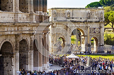 Large crowd of people staying in line at Colosseum near Arch of Constantine Editorial Stock Photo