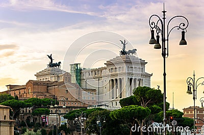 ROME , ITALY ;Roman walks. Spectacular sunset in Rome with the Monument of Victor Emmanuel II in background Editorial Stock Photo