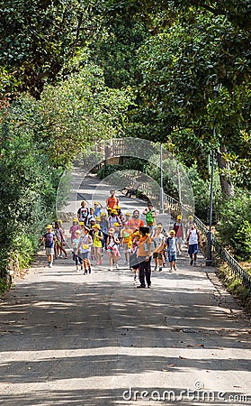 ROME, ITALY - September 5 2016:Group of children goes on a tour of Roma zoo. Vacation, a day off, explore, Editorial Stock Photo