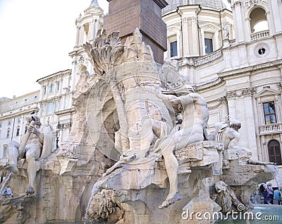 Rome, Navona square Piazza Navona church of St Agnese and fountain of the four rivers by Bernini. Statue depicting the river Ni Editorial Stock Photo