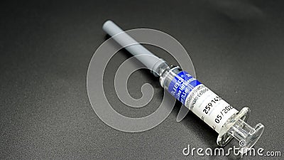 Flu vaccine vials, FLAUD from Novartis Vaccines and Diagnostics. currently very useful for excluding ambiguity with the Covid19 pa Editorial Stock Photo