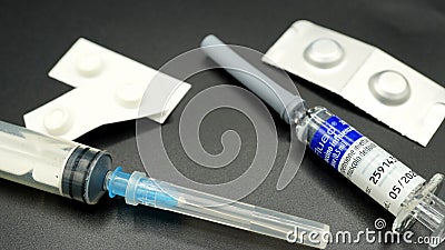 Flu vaccine vials, FLAUD from Novartis Vaccines and Diagnostics. currently very useful for excluding ambiguity with the Covid19 p Editorial Stock Photo