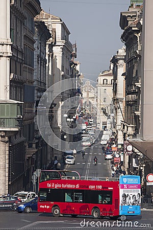 Rome. Tourist red bus. Via del Corso, historic center Editorial Stock Photo