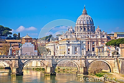 Rome and Vatican. Tiber river bridge od Saint Angelo and Basilica of Saint Peter in Rome view Stock Photo