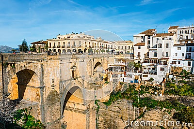 El Tajo Gorge Canyon with new bridge and white spanish houses in Ronda, Andalusia, Spain Editorial Stock Photo
