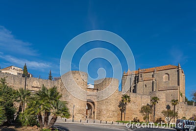 Ronda, Spain - January 8, 2020: Gates of Almocabar and Church of the Holy Spirit, Province Malaga, Andalusia. Copy space for text Editorial Stock Photo