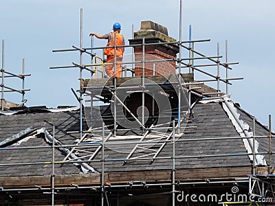 Roof and Chimney Repair Stock Photo