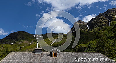 roof of a house in the mountains, alpine view, living in harmony with nature Stock Photo