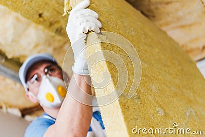 Roof Insulating by Mineral Wool Stock Photo