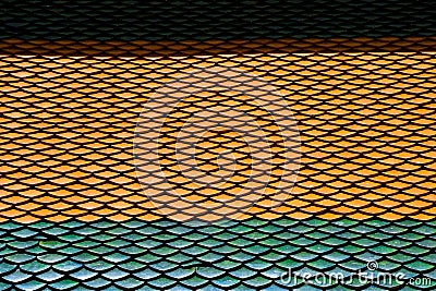 The roof is made of stacked clay tiles. Pattern of Thailand temple roof top Stock Photo