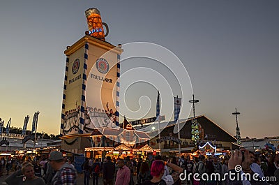 Roof of the Paulaner tower with the famous beer stein. Oktoberfest Editorial Stock Photo