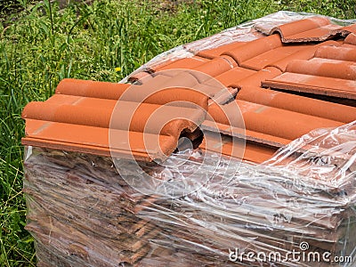 Roof tile pallet material construction site Stock Photo