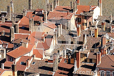The roof tiles and chimneys of houses in Lyon`s old quarter Stock Photo