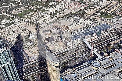 Roof view on Dubai from the 154th floor of the Burj Khalifa Editorial Stock Photo