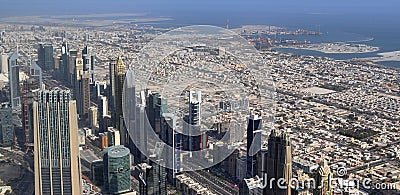 Roof view on Dubai from the 154th floor of the Burj Khalifa Editorial Stock Photo