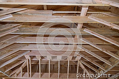 Roof wood framework construction in progress new residential beam of home under construction Stock Photo