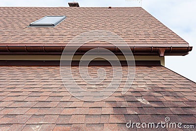 Roofing construction and building new house with modular chimney, skylights, attic, dormers and eaves. Stock Photo