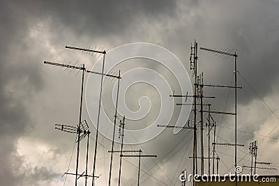 Roofs of houses full of TV antennas, satellite dishes Stock Photo