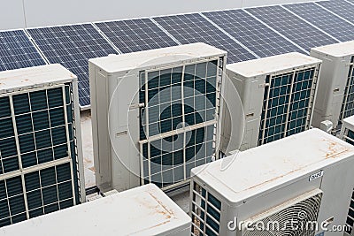 Rooftop air conditioning and solar on an apartment Editorial Stock Photo