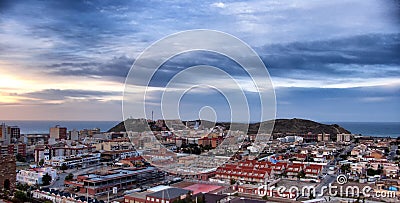 Rooftop landscape of Spanish town at sunrise Stock Photo