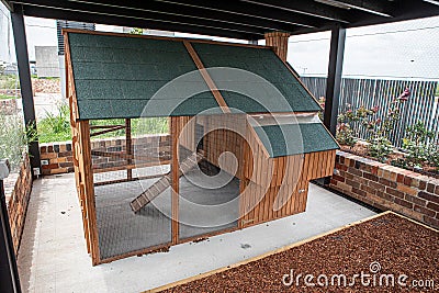 Rooftop wooden chicken coop australia Stock Photo