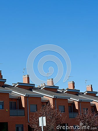 Rooftops of houses in suburban district Ensanche de Vallecas in Madrid, Spain. Vertical photo Stock Photo