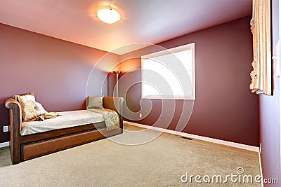 Room in burgundy color with leather couch Stock Photo